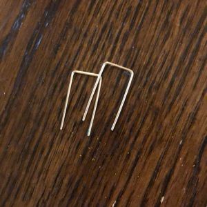 Windblown gold plated staple earrings